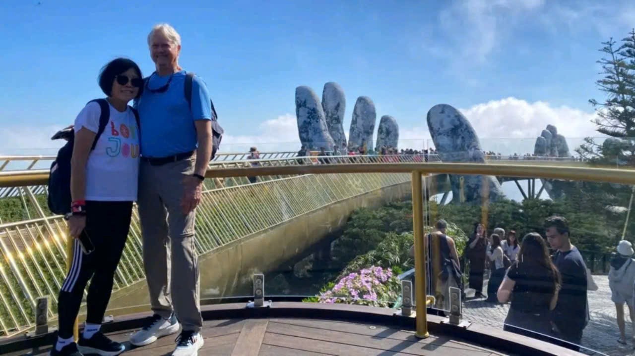 Tourists visiting the Golden Bridge at Ba Na Hills near Da Nang, Vietnam