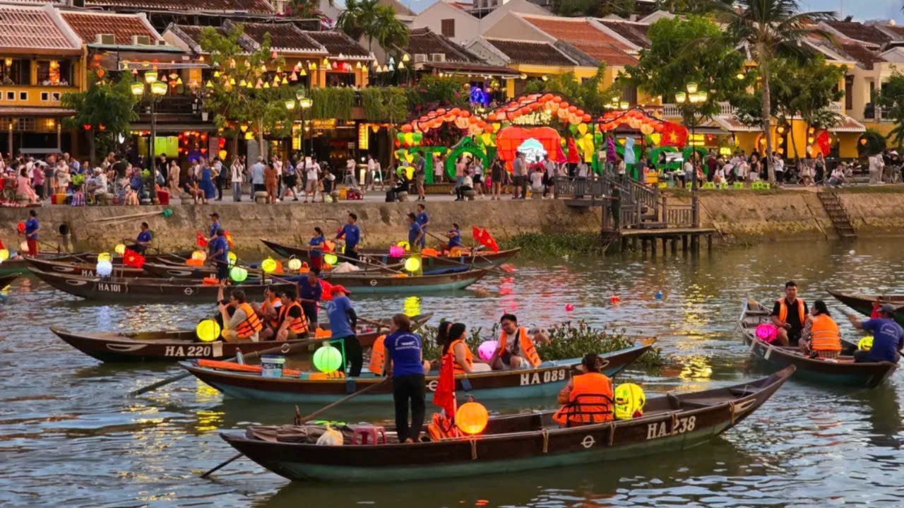 Hoi An lantern boats on Thu Bon River late afternoon