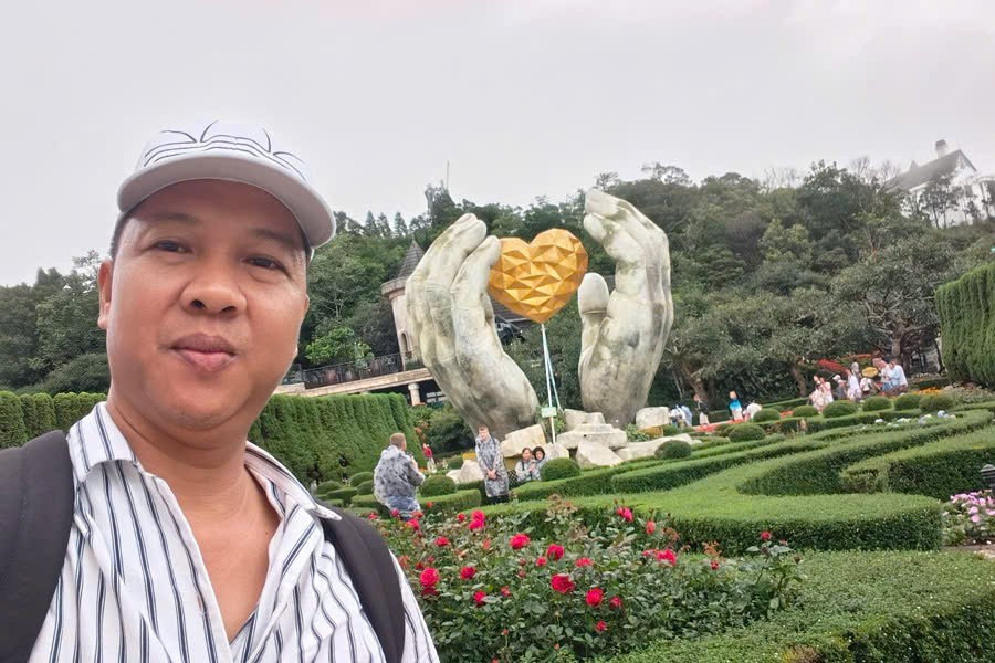 Viet Nguyen, Founder & CEO of Phong Nha Pioneer Travel, at the flower garden in Ba Na Hills, Da Nang