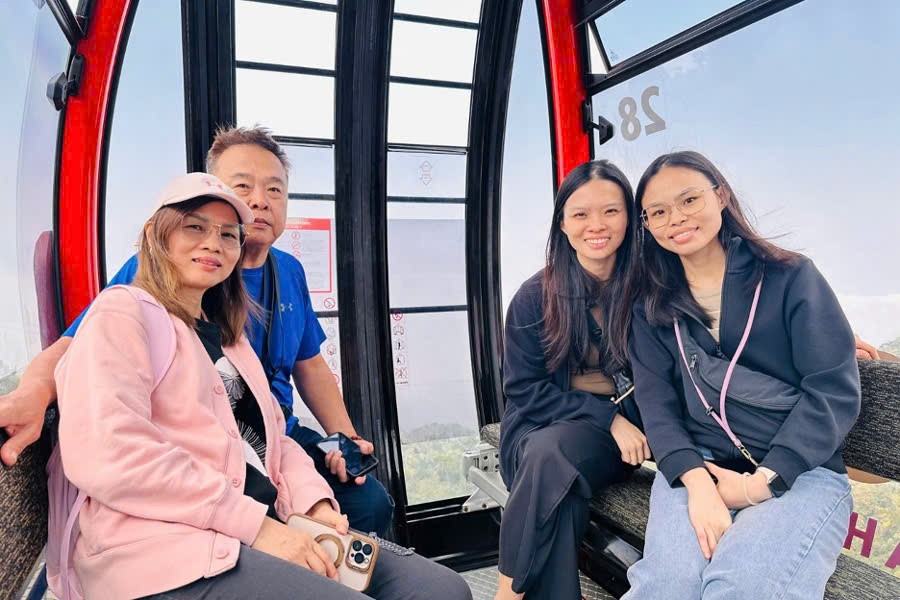 Guests enjoying a cable car ride to Ba Na Hills
