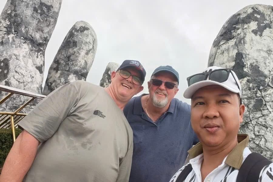 Viet Nguyen with guests at Golden Bridge Ba Na Hills