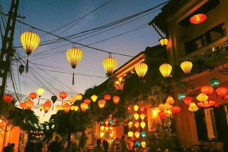Historic yellow buildings and colorful lanterns in Hoi An Ancient Town Vietnam